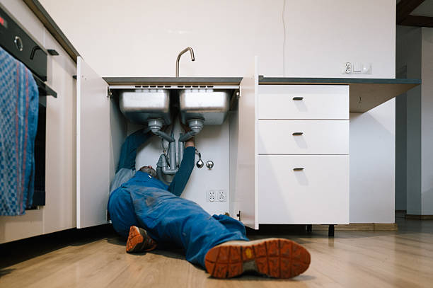 Professional Plumbing technician working in Emington, IL